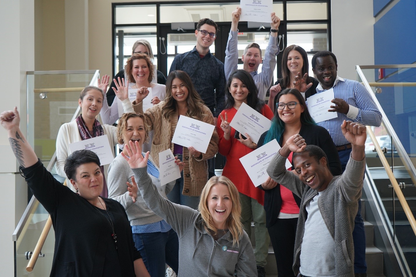 Group of jubilant Affinity Credit Union Employees