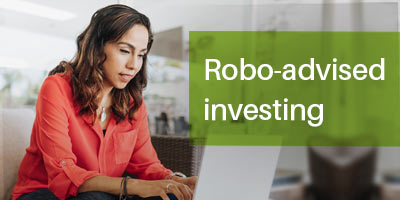 woman investing online at home
