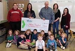 playschool staff and kids accept cheque